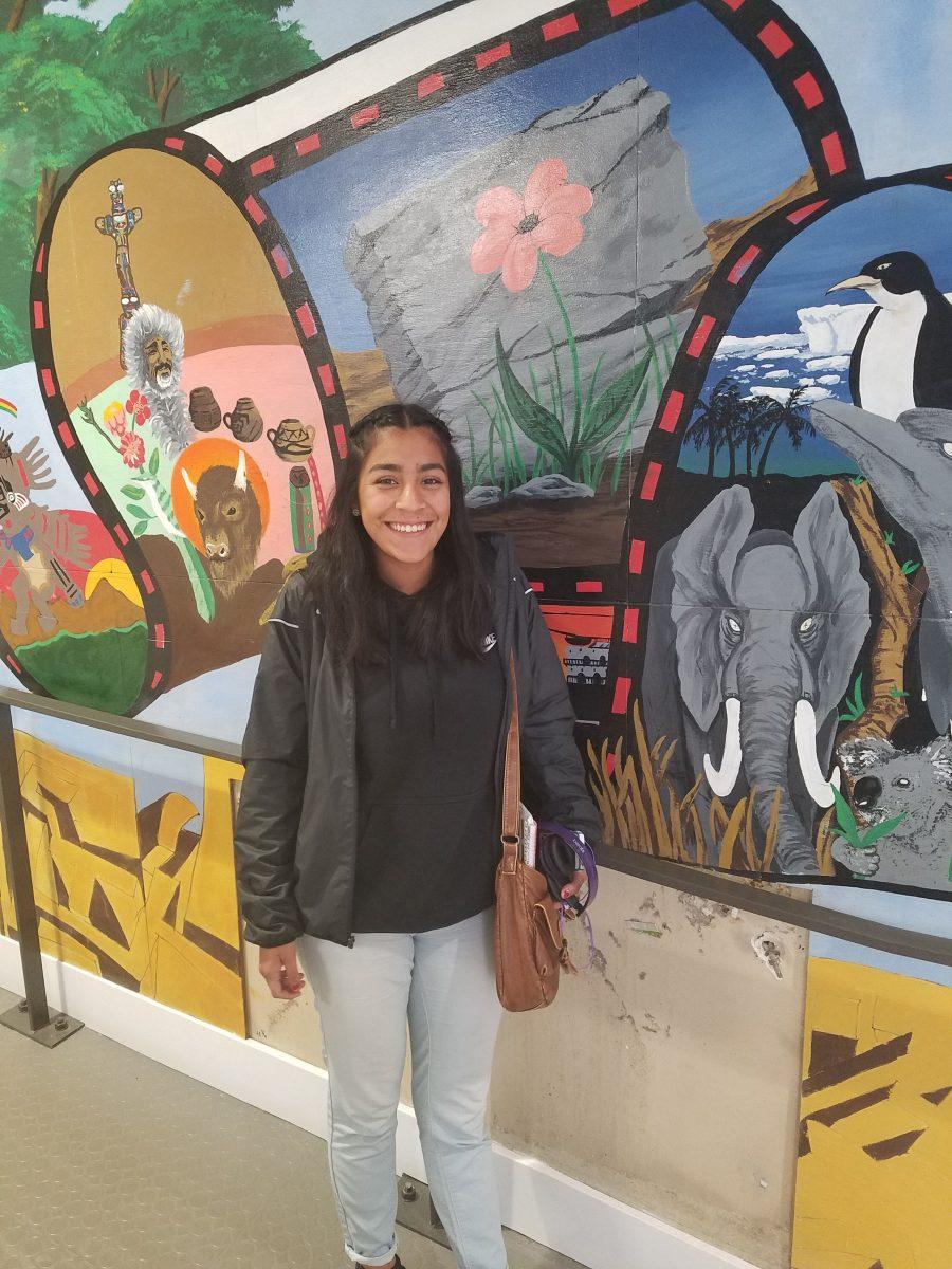 Michelle Jaramillo (12), beside a mural at Franklin. Photo by Jonas Boone.