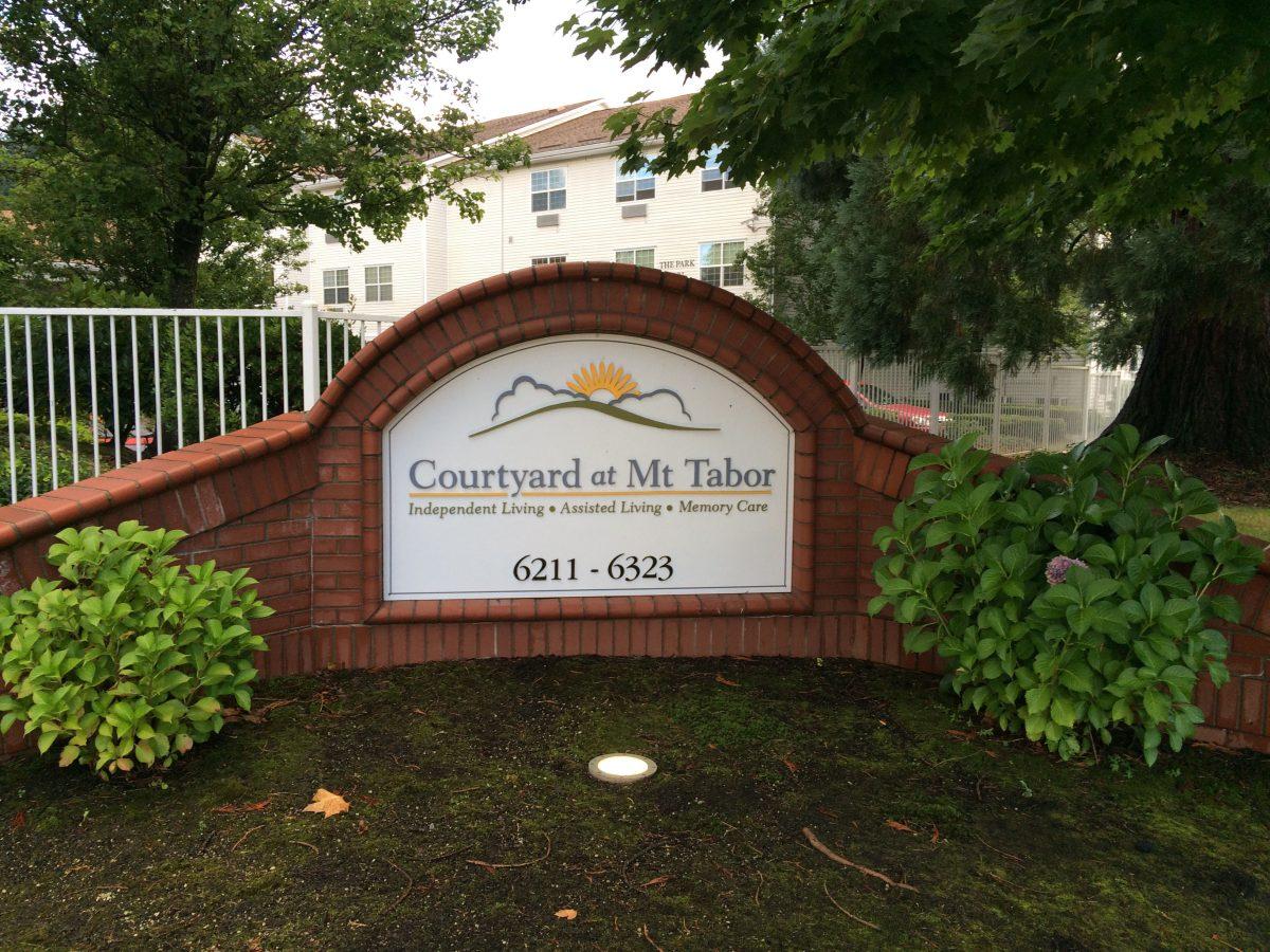 Courtyard at Mt Tabor’s front sign, facing Division Street. The elderly living facility is just a short five block walk from Franklin High School. Photo by Maya Horten