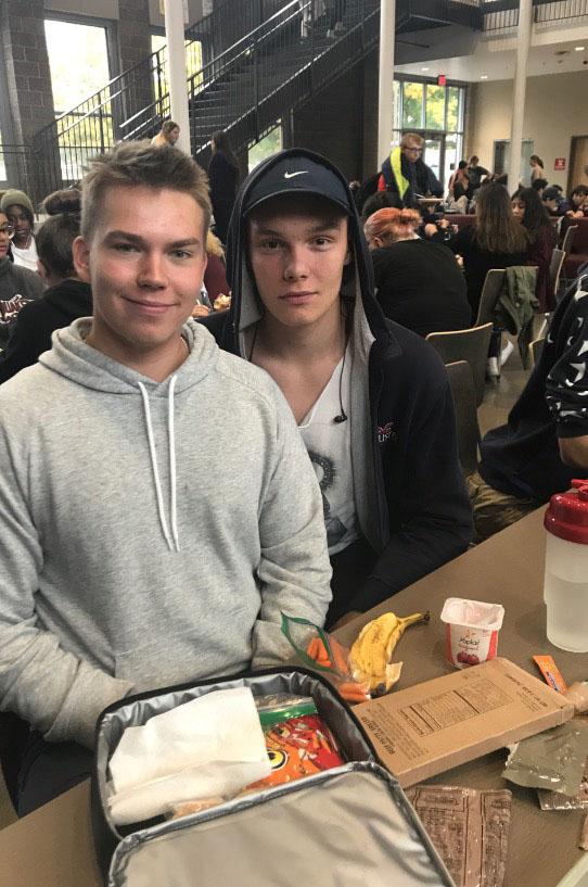 (from left) Tanskanen and Biolveský eat lunch in Franklin’s cafeteria. Not pictured Caballero and Crespo. Photo by Destiny Sagli.