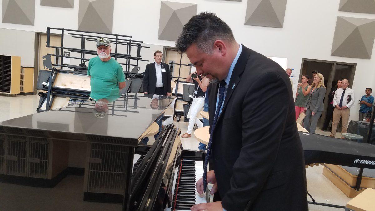 Guadalupe Guerrero plays the piano in the new Franklin band room. The PPS board believes that Guerrero’s music education and his other experiences make him the most suitable person for the position. Photo by Nathan Wilk.