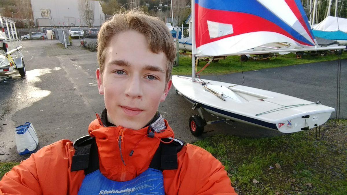 Pierre Carr (12) prepares a boat for an outing at the Willamette Sailing Club. Photo by Pierre Carr