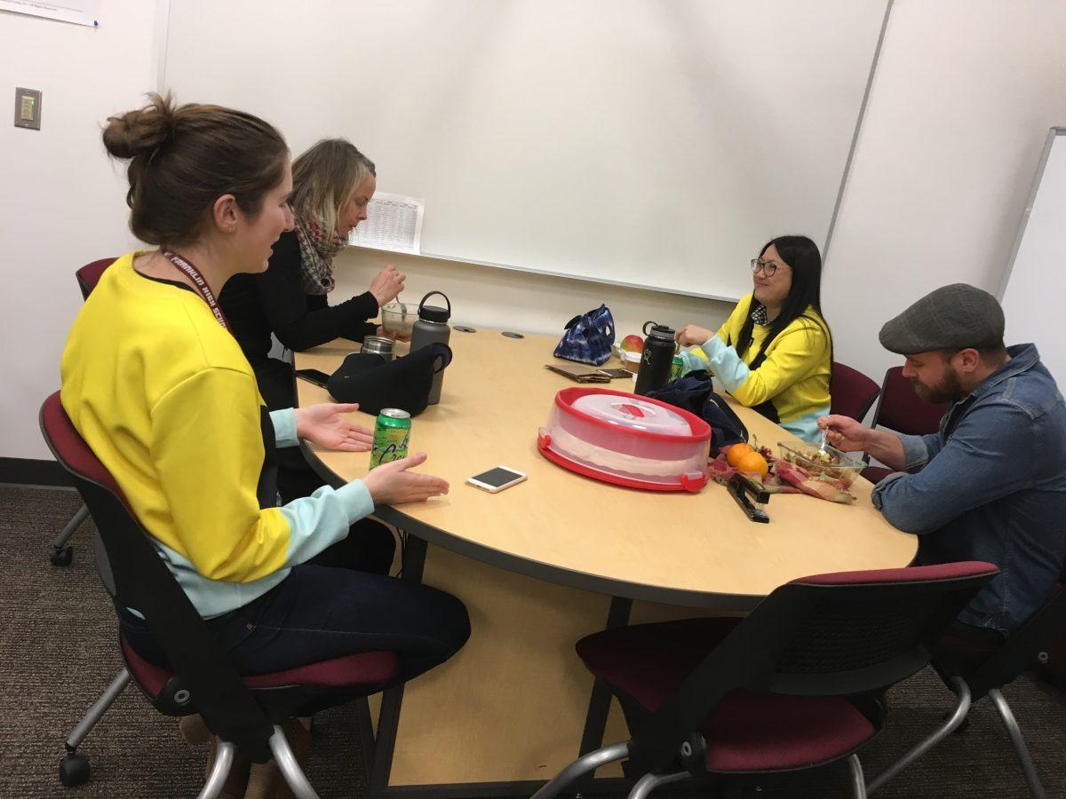 From left to right, English teachers Elizabeth Kirsch, Dana Vinger, Elisa Wong, and Scott Aronson sit together during lunch. In face of low morale, community among teachers is especially important. Photo by Kaley Seeberger