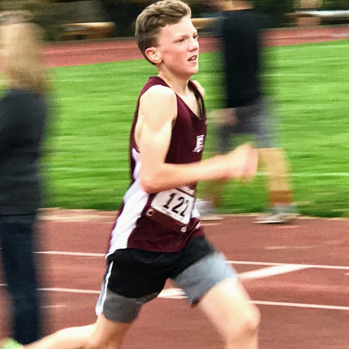 Craig Barber (9) races to the finish at a cross country meet. The junior varsity team placed first at the district cross country meet on October 25.  Photo by Shawn Kirkeby.