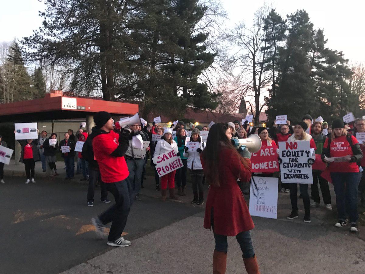 Pioneer community members rally outside the Holladay campus before a meeting with the Superintendent on December 13. They chanted, “Pioneer united, we’ll never be divided,” and “Hey! Ho! Pioneer will not go!” Photo by Jamie Horner.