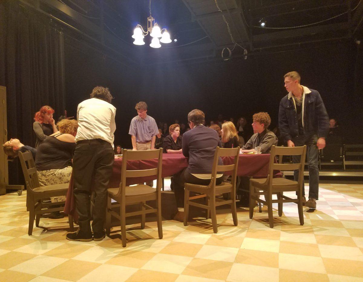 The cast acts in their first performance of 12 Angry Jurors. The actors in both casts were selected out of Josh Forsythe’s eighth period Advanced Acting class. Photo by Jonas Boone.