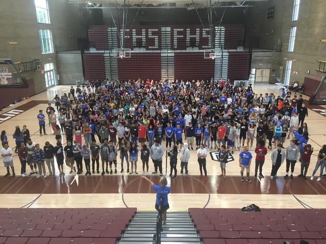 FHS class of 2021 fills the gym on orientation day. Link Leaders welcome freshmen into high school. Photo by Pam Garrett.