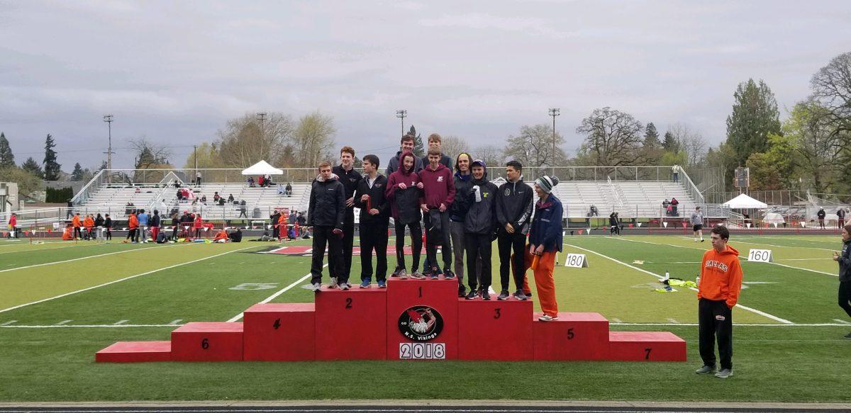 Franklin’s distance medley relay team claims their place at the top of the podium at the Viking Relays meet, hosted by North Salem High School on April 13. Photo by Jackson Hartigan.