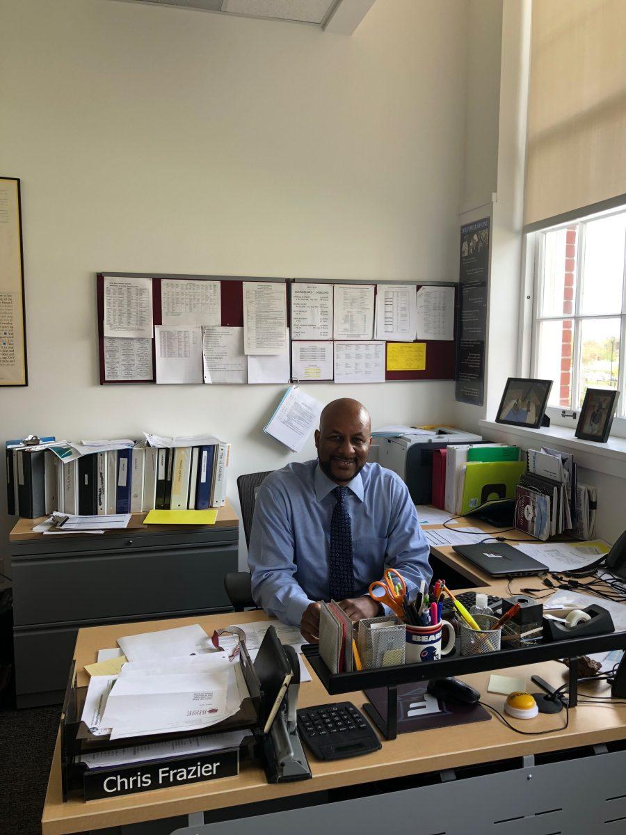 Chris Frazier sits in his office in the main office building of FHS. Previously a teacher and dean at De La Salle North Catholic High School, Frazier has been a vice principal at Franklin since 2014.  Photo by Maya Horten.