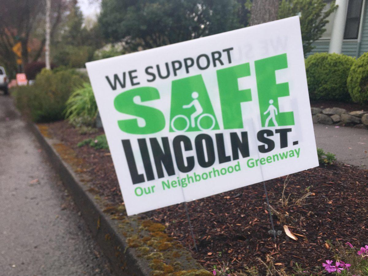 A “Safe Lincoln Street” sign sits outside a house that has a red “X” spray painted in front of it. Most of the houses that have had red X’s spray painted outside had this same sign on their lawn. Photo by Abby Chapman.