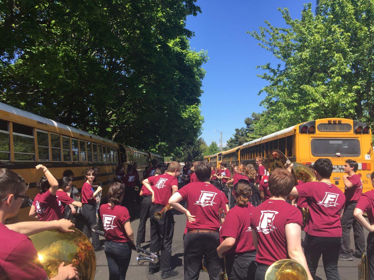 The Franklin Band relaxes moments after the conclusion of the St. John’s parade on Saturday, May 12. Photo by Griffin Schumock.