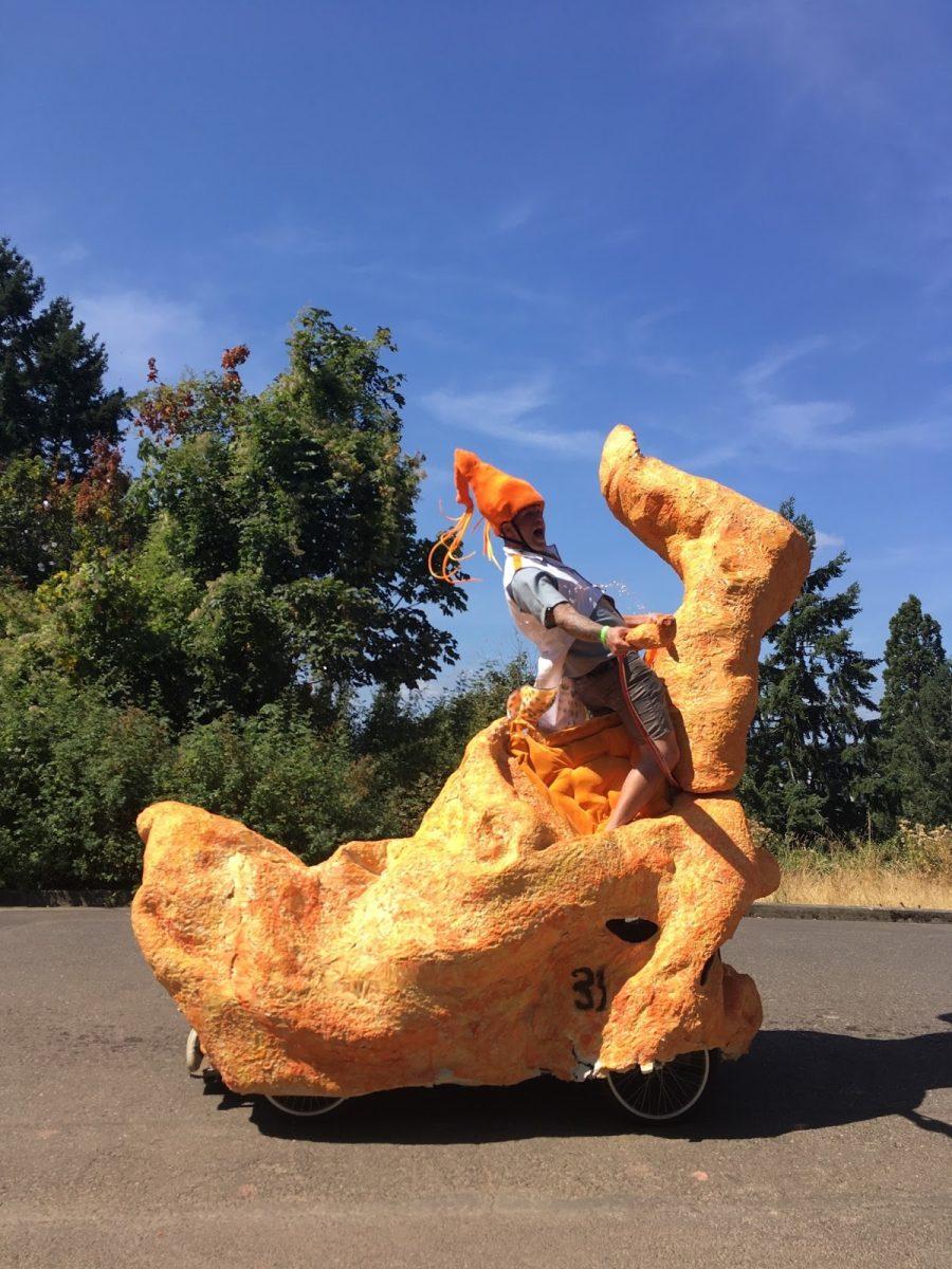 A Soapbox Derby car shaped like a Cheeto. Drivers try to make their cars as original as possible. Photo by Elliot Byrne.