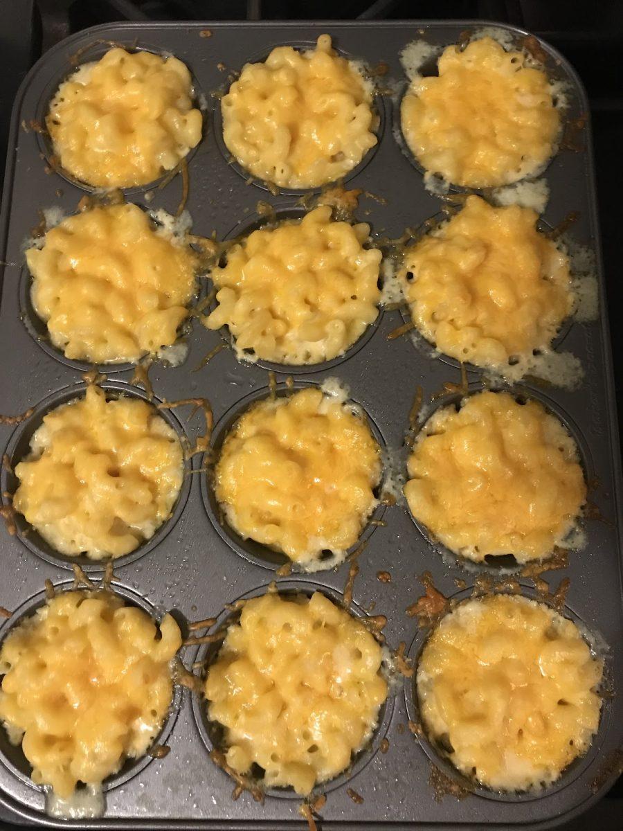 Fresh out of the oven, mac & cheese cups cool quickly. These bite-sized treats make a perfect snack or meal. Photo by Sadie Tresnit.