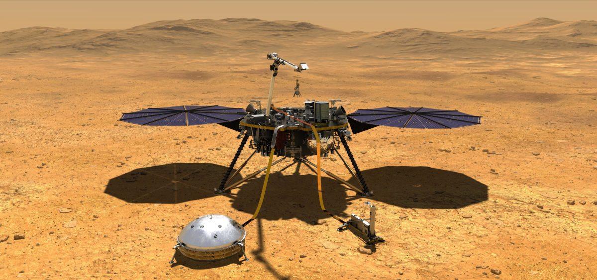 Rendering of InSight landed on Mars with its seismometer (right) and heat probe (left) deployed. InSight won’t begin to collect data for months until it fully surveys the landing site. Credit: JPL, NASA.