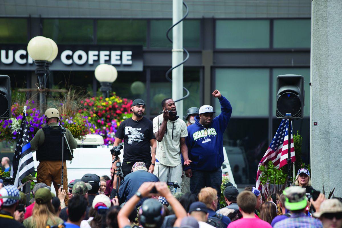 Patriot Prayer and Solidarity Against Hate groups hold demonstrations in Seattle. Solidarity Against Hate is a Seattle “General Defense Committee” to stand up against far-right extremists. Photo via Wikimedia Commons.