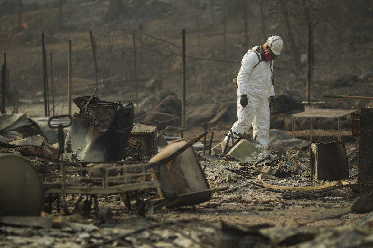 Credit: California National Guard Flickr.
Soldiers from California Army National Guard search through debris in Paradise, CA.

