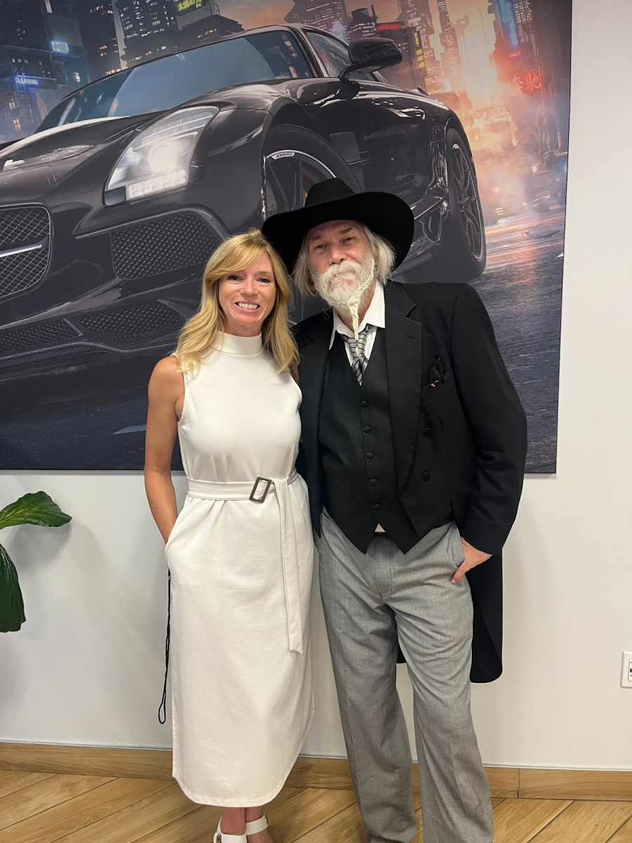 Tod Hunter Foulk, founder of Portland Fashion Week, and Lisa, of the Mercedes Benz of Wilsonville at Couture Night. Portland Fashion Week 2024 was held at the dealership and is known as one of the most sustainable fashion weeks. Photo by 