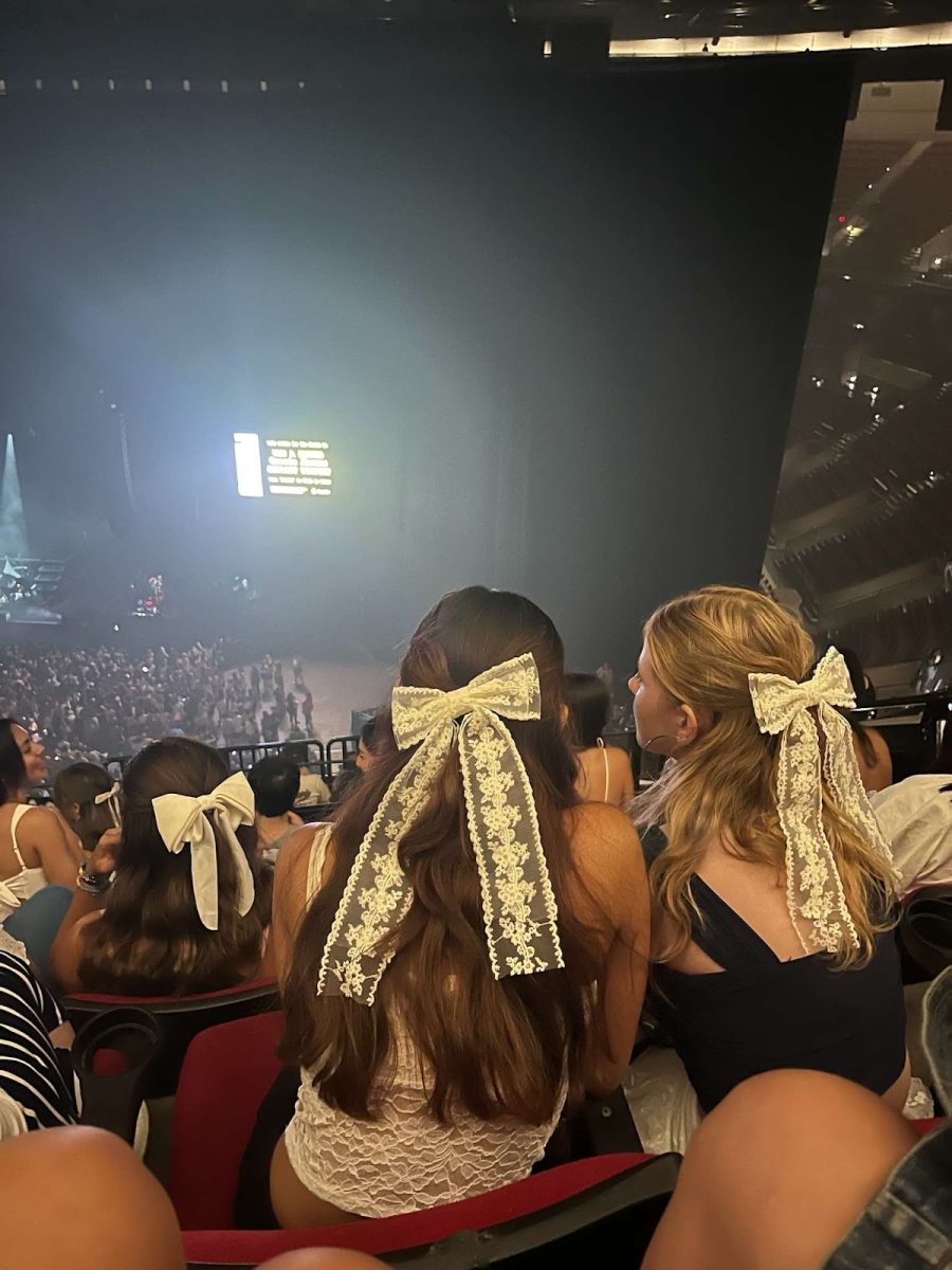 Gracie Abrams’ fans waiting for her concert to start — with anticipation — at the Moda Center. Many of them are wearing bows, a classic tribute to Abrams’ style. Photo by anonymous fan.