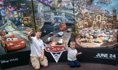 My dad and I at the movie theater in 2011 ready to watch Cars 2. Cars was my favorite movie series at the time and was also a big part of my childhood. Photo by Megan Kirsch-McMaster.