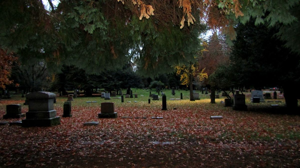 Southeast Portland’s Lone Fir Cemetery on a gloomy fall day. The cemetery, established in 1866, is the final resting place forover 30,000 people and is reported by some to be haunted. Photo by Norah Dobrot.
