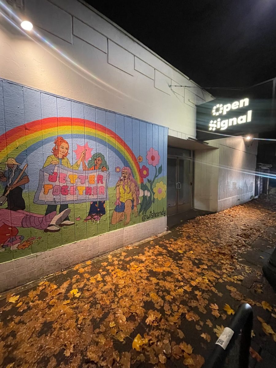 Open Signal’s front mural and sign located at 2766 NE Martin Luther King, Jr Blvd. The bright colored murals on the side of the building give a warm welcome to the community they've cultivated.