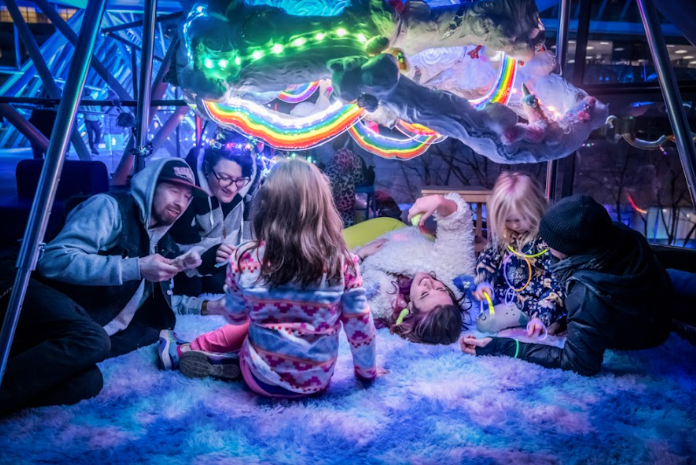 

Festivalgoers enjoying the 2024 installation “WhimsyWonderCloud” by Nikki Daskal. Installations like this one will take over Portland in February. Photo by Shannon Bager.