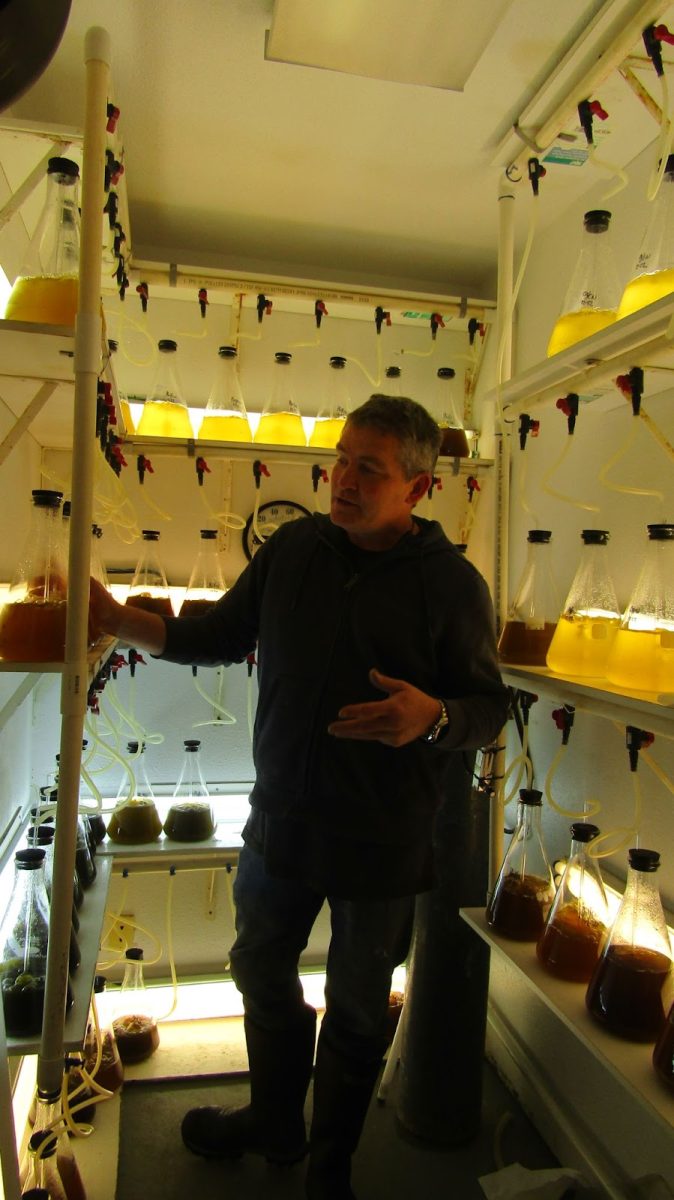 Alan Barton of the Whiskey Creek Shellfish Hatchery showing their algae growth lab. Oregon’s oysters and clams are threatened by changing ocean temperatures and water chemistry.