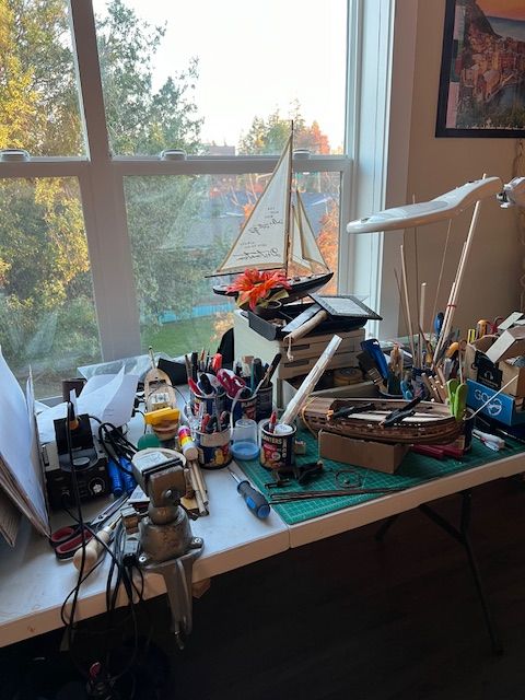 A workstation belonging to Stephen Hart, a resident at Whitewood Gardens. Hart often spends his afternoons here working on his model ship. Photo via Chris Nelson.