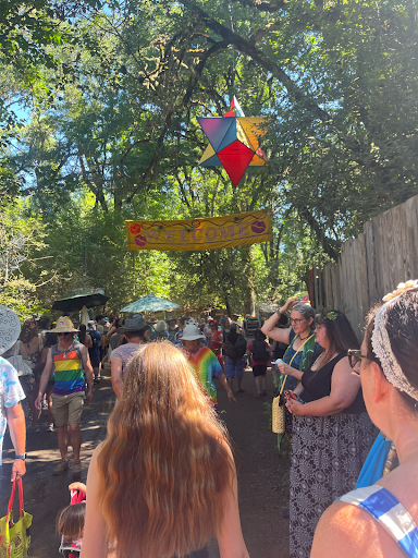 The welcome sign at the Oregon Country Fair in Veneta, OR. Attendees often dress in elaborate, colorful outfits. Photo by Joey Maloney. 