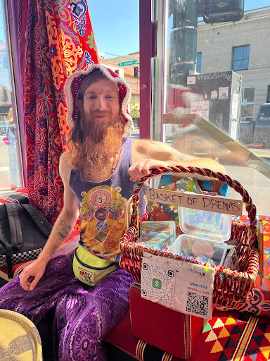 Red Van Grow, a local artist, basks in Portland sunshine. Although it’s known for rain, Portland brightens in May. Photo by Francesca “Frankie” Silverstein.