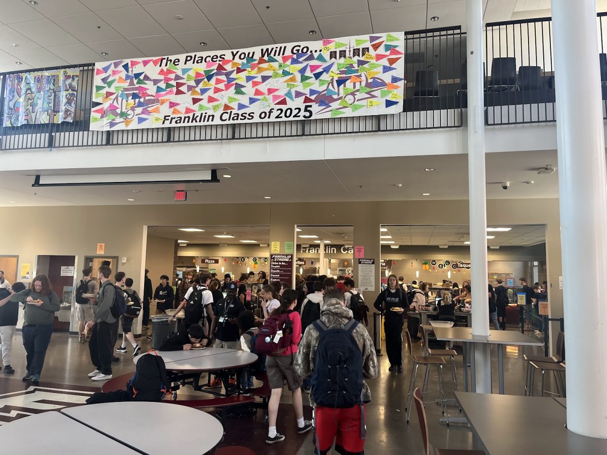 Students flood Franklin’s cafeteria to get lunch. High demand for school lunches often makes the cafeteria quite crowded at lunchtime.  Photo by Jonathan Sommer.