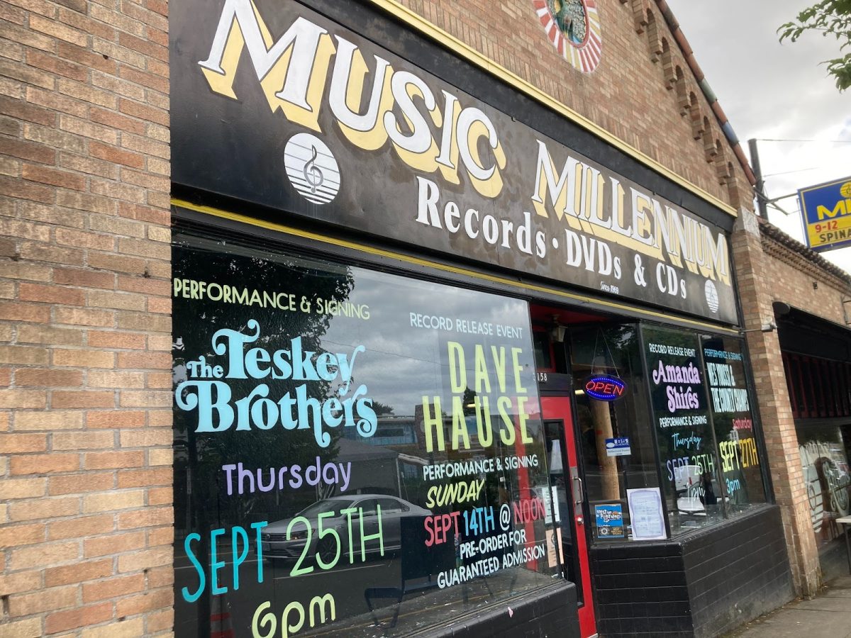 Music Millennium’s storefront, located in East Portland, on Sept. 14, 2025. Their upcoming events are listed in the windows so fans can see when to stop by for their favorite artists. Photo by Kaya Goddard.