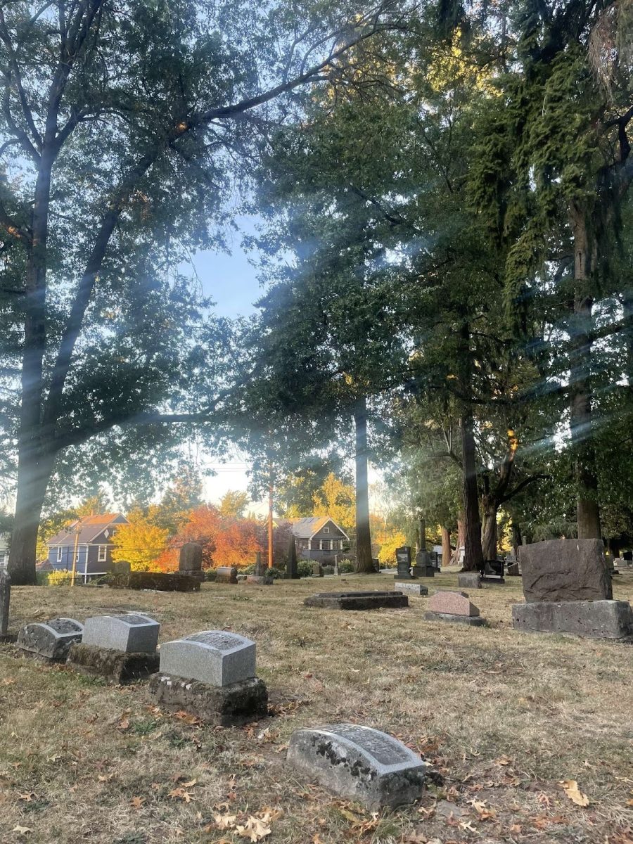 The Lone Fir Cemetery at dusk. Human mortality is inevitable, but this scenic graveyard represents light and tranquility among death. Photo by Sofie Salewsky.