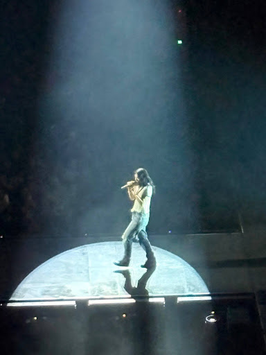 Lorde struts down the stage in a simple white T-shirt and ripped jeans, performing “Hammer,” from her newest album, “Virgin.” Lorde performed her new album along with some of her other previous hits to a nearly sold out Moda Center on Oct. 21. Photo by Cleo Craig.