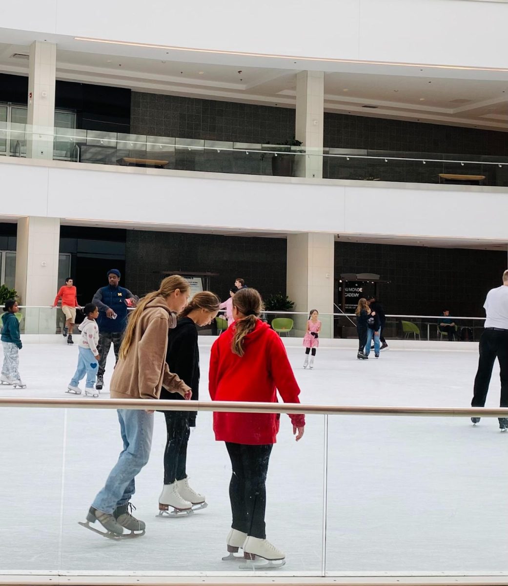 A group of ice skaters at the Lloyd Center Ice Rink. Ice skating is a fun and often underrated activity for all ages; local ice rinks, like the Lloyd Center Ice Rink, make it accessible for Portlanders. Photo by Easton Atlansky.