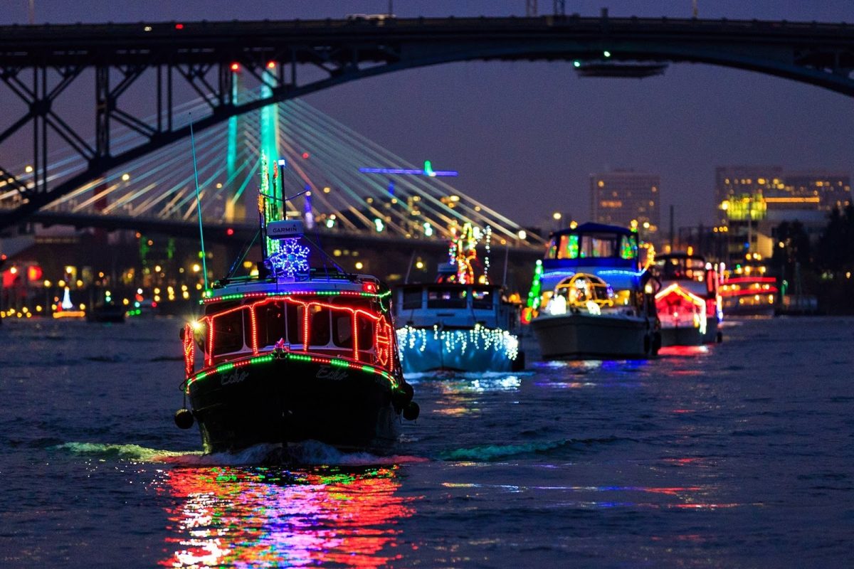 Boats decked out in festive lights during last year’s Christmas Ships Parade. Every year, volunteers sail down the Willamette and Columbia Rivers, ringing in the holiday season. Photo via Andy Smith.