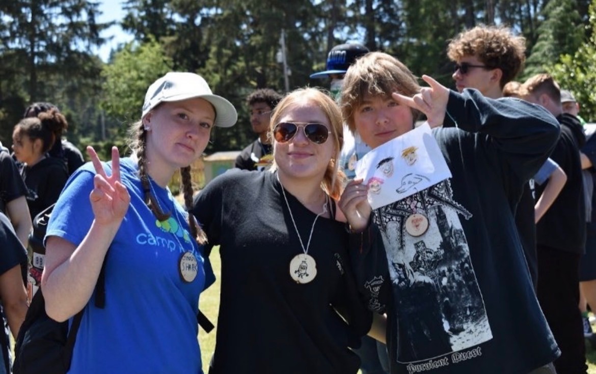 Campers Monroe Colbath, farthest right, and Chloe Stevens, middle, at Camp Kesem. Kesem is a week-long summer camp around the country specifically for children of parents with cancer. Photo via Monroe Colbath