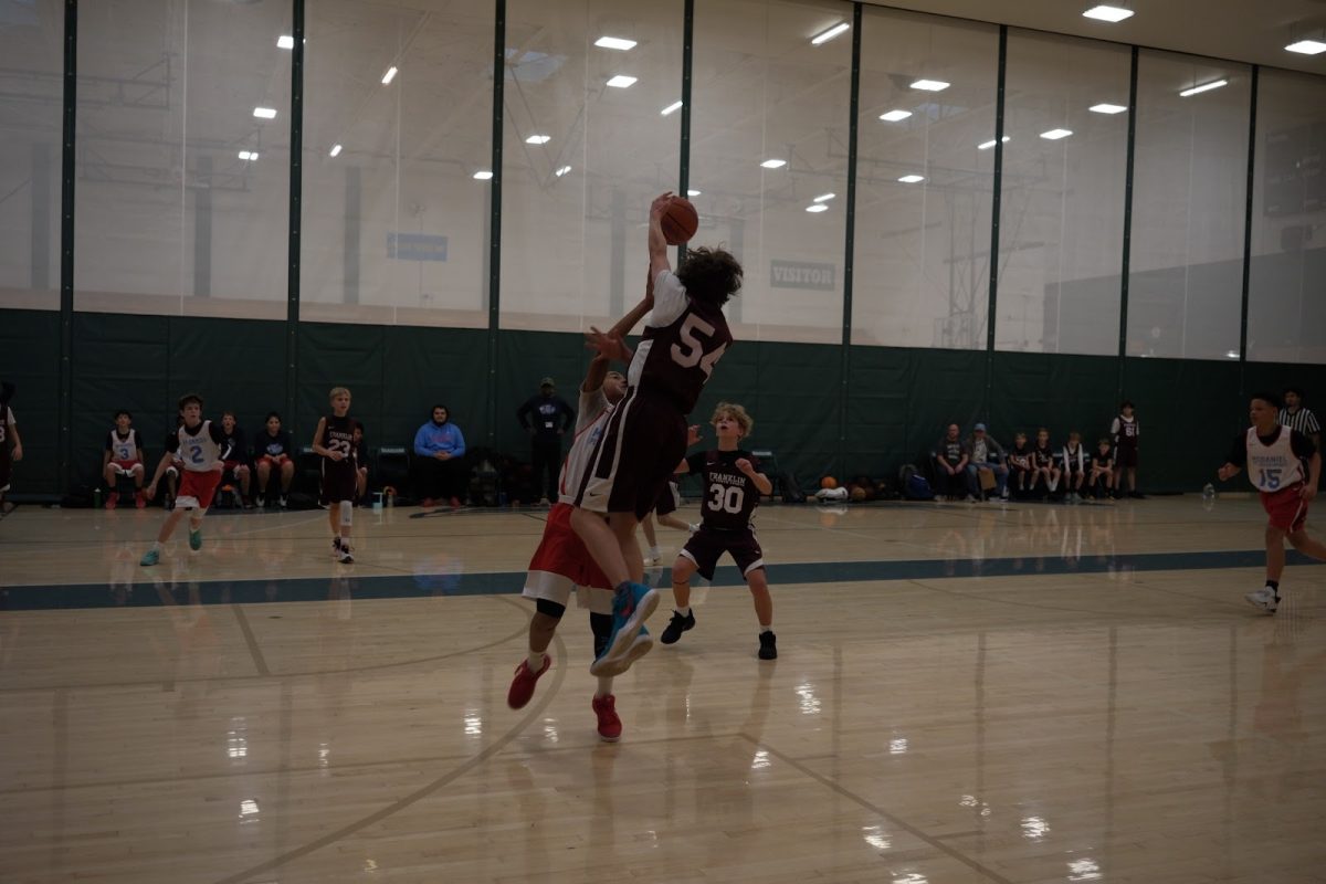 The PIL sixth grade boys grey team playing one of their first games of the 2025-2026 season against McDaniel. PIL basketball gives middle school players an opportunity to prepare for their future high school teams. Photo by Clay Salewsky.