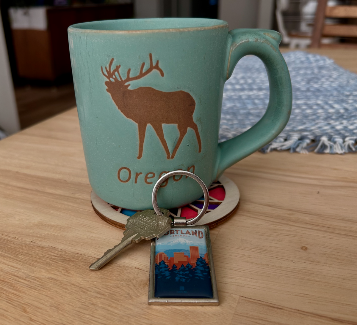Portland house keys rested upon an Oregon mug. Portland has officially launched its new home share pilot program, offering homeowners $1,000 grants to rent out spare bedrooms.